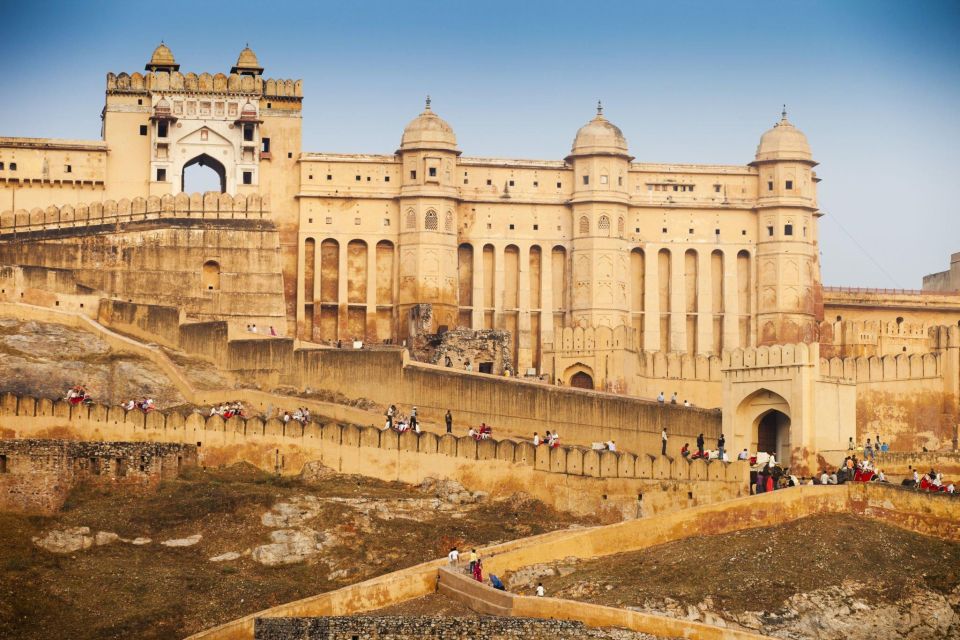 From Delhi: Private Jaipur & Amber Fort Guided Tour by Car - Hawa Mahal: Latticed Windows and a Quick Look at a Big Icon