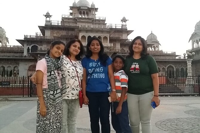 Full Day Private Tour of Jaipur : Sightseeing tour - Amber Palace (Fort) with a guide doing the heavy lifting
