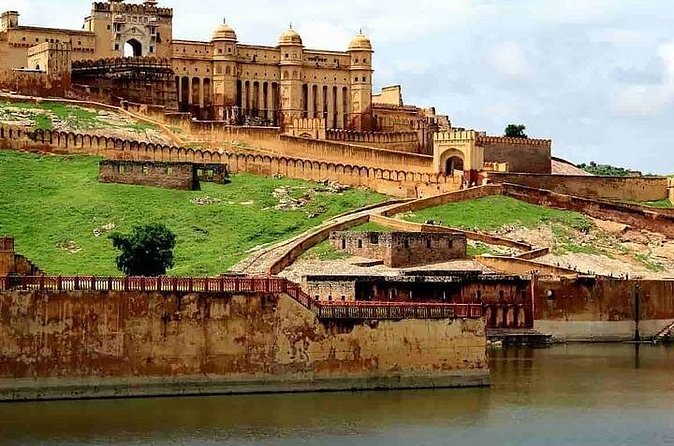 Full Day Sightseeing Jaipur Tour by Car With Guide Include Lunch - Patrika Gate in the morning: photos, colors, and a flower-market vibe