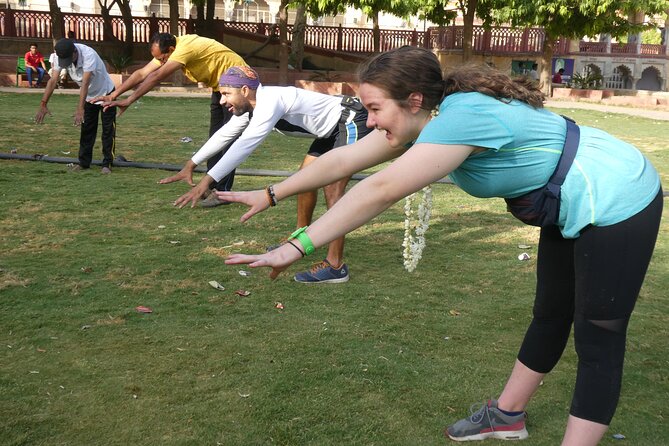 Guided Morning Bicycle Tour with Food Tasting in Jaipur - Govind Devji Temple garden: markets, smells, and laughing yoga
