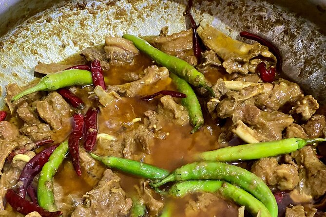 Jaipur Evening Food & market Tour: Savor the Test of the Jaipur - Stop 4: Rawat Misthan Bhandar for Rajasthani sweets and savory bites
