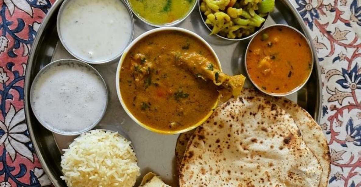 Jaipur Home Cooking Experience with Authentic Lunch/Dinner - Warm drink, kitchen welcome, and an Indian food overview