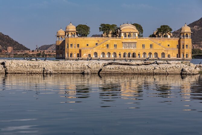 Jaipur Private Sightseeing Full Day Tour By Car and TukTuk - Getting Around: AC Pickup, Tuktuk Stops, and a Calm Pace