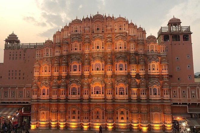 Private day tour of Jaipur with Driver and Guide - Jal Mahal: short stop, calm water-pastel payoff
